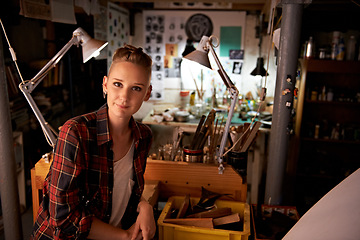 Image showing Artist, studio and portrait of woman in workshop for creative sculpture or project at night. Artisan, workplace or person with pride or confidence as carpenter with talent for working with tools