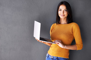 Image showing Woman, portrait and laptop with mockup in studio for social media, download or website scroll on black background. Space, pc or student face online with internet, elearning or upskill training course