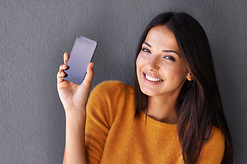 Image showing Woman, portrait and show smartphone with smile for advertising or subscription, promotion and presenting. Female person, mobile phone or cellphone for social media and information, browsing and apps.