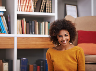 Image showing Portrait, smile and African woman in library, floor and home study for reading or education. Books, novel and story for happy female with natural afro hair, learning and relax for knowledge or hobby