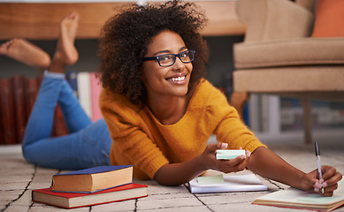 Image showing Woman, portrait and library books with notebook or academic research paper, university education or scholarship. Female person, glasses and floor as student for exam learning, literature or project