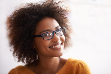 Image showing Woman, portrait and smile with confidence or glasses with positive good mood, cheerful or white background. Female person, student and eyewear for vision with curly hair or relaxed, happiness or calm
