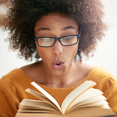 Image showing Woman, book and reading or excited in library or literature knowledge or university education, story or information. Female person, glasses and shock learning or campus scholarship, school or college