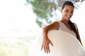 Image showing Happy woman, portrait and workout with exercise ball for training, health and wellness in nature. Female person or yogi with smile for pilates, warm up or fitness in confidence with gym equipment