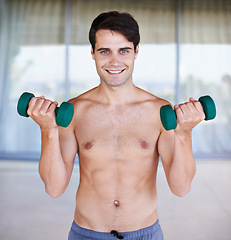 Image showing Happy man, portrait and dumbbells for weightlifting, fitness and muscle training for body and self care. Topless athlete, exercise and endurance in workout at home for health, wellness and strength