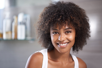 Image showing African woman, portrait and smile in bathroom for beauty, wellness and afro in home to start morning routine. Girl, person and happy with cosmetics, change and transformation with hair in apartment