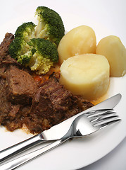 Image showing Beef stew and broccoli