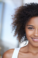 Image showing Half, face and black woman with beauty and happiness from dermatology and natural glow on skin. African, girl and portrait of skincare, cosmetics or hair care for curly afro hairstyle closeup