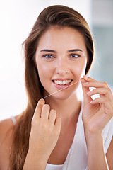 Image showing Smile, oral care and portrait of woman with floss for health, wellness and clean routine for hygiene. Dental, happy and female person with dentistry tool for teeth or mouth treatment in bathroom.