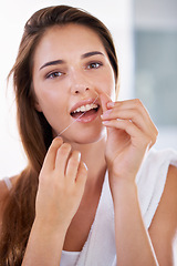 Image showing Health, dental and portrait of woman with floss for grooming, wellness and clean routine for hygiene. Oral care, happy and female person with dentistry tool for teeth or mouth treatment in bathroom.