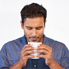 Image showing Calm, man and drink of coffee in morning with peace, happiness and breathe in aroma of espresso. Happy, person and relax with latte, matcha or tea in white background of studio with mock up space