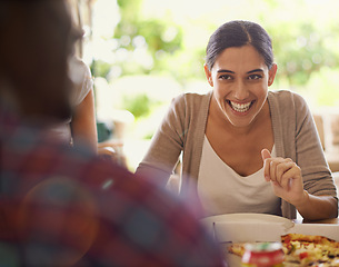 Image showing Pizza, happy and social gathering with group of friends eating together in restaurant for bonding. Smile, funny or laughing with young woman enjoying fast food for party, hunger or conversation