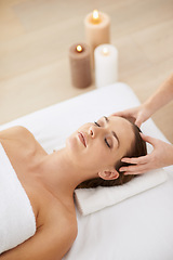 Image showing Relax, head massage and woman at spa for health, wellness and zen with luxury holistic treatment. Self care, peace and girl on bed for aromatherapy, comfort and calm pamper service at hotel salon