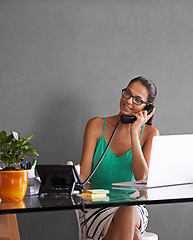 Image showing Phone call, remote work and landline with woman in office for communication or reception. Laptop, thinking and smile with happy young secretary answering telephone in small business or startup