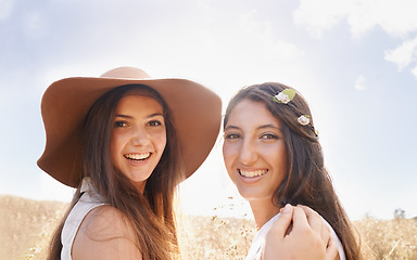 Image showing Portrait, sunshine and field with women, friends and smile with vacation or countryside with adventure. Face, girls or people with weekend break or nature with fresh air, journey or windy with summer