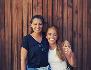 Image showing Portrait, love and woman friends on wooden background together for bonding or relationship. Smile, funny or laughing and happy young people having fun with fashion in summer for holiday and vacation