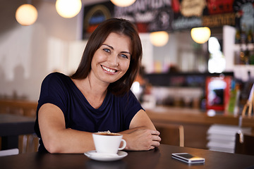 Image showing Portrait, smile and woman for relax in cafe with coffee, cappuccino or latte drink on lunch break. Caffeine, mobile phone and face of person for hot beverage for calm, peace and weekend off at bistro