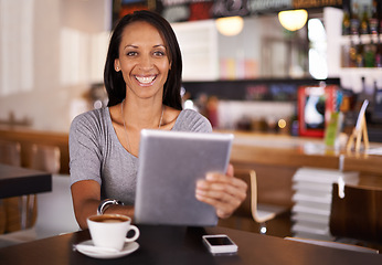 Image showing Happy woman, portrait and coffee with tablet at cafe for research, browsing or networking. Young female person with smile on technology for online communication or internet at indoor restaurant