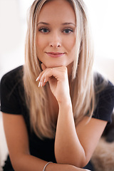 Image showing Portrait, woman and thinking with hand on chin, thoughts and planning in living room. Female person, reflect and contemplating idea for future plans with face smile at home or apartment or house