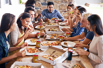 Image showing Group, friends and party with pizza, restaurant and diversity for joy or fun with youth. Men, Women and fast food with drink, social gathering and snack for lunch or eating at italian pizzeria