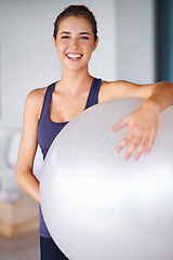 Image showing Portrait, fitness and pilates ball with sport woman at gym for health, wellness or workout. Exercise, training equipment and happy young person satisfied with performance, progress or wellbeing