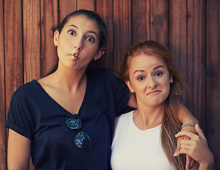 Image showing Portrait, funny face and woman friends on wooden background together for bonding or relationship. Love, comedy or humor and happy young people having fun summer for holiday, vacation and getaway