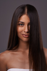 Image showing Portrait, straight hair and beauty of woman, skincare and makeup isolated on a gray studio background. Hairstyle, face and Indian model in cosmetics at salon for treatment or care at hairdresser