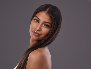 Image showing Salon, hair and portrait of woman on gray background for healthy texture, wellness and beauty. Haircare, hairdresser and face of person with long hairstyle for products, cosmetics and shine in studio