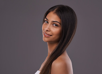 Image showing Salon, hair and portrait of woman on gray background for healthy texture, wellness and beauty. Haircare, hairdresser and face of person with long hairstyle for treatment, cosmetics or shine in studio