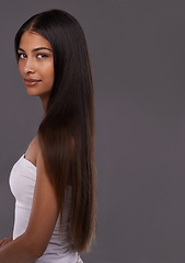 Image showing Hair care, portrait and beauty of woman, skincare and mockup space isolated on gray studio background. Hairstyle, face and Indian model in makeup cosmetics at salon for body treatment at hairdresser
