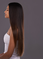 Image showing Long hair, beauty and profile of woman in makeup, glow and eyes closed isolated on a gray studio background mockup space. Hairstyle, cosmetics and young model at hairdresser, salon and body treatment