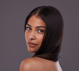 Image showing Hair, salon and portrait of woman in studio for healthy texture, wellness and beauty. Haircare, hairdresser and face of person with long hairstyle for makeup, cosmetics and shine on gray background