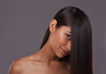 Image showing Portrait, straight hair and beauty of woman in makeup for skincare isolated on a gray studio background. Hairstyle, face and Indian model in cosmetics at salon for treatment or care at hairdresser