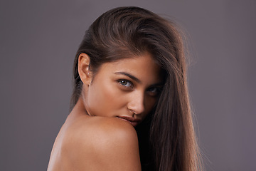 Image showing Woman, studio and haircare with natural beauty, Indian female person with luxury and salon treatment. Nourishing and keratin blowout for results and wellness, confident and isolated glowing model