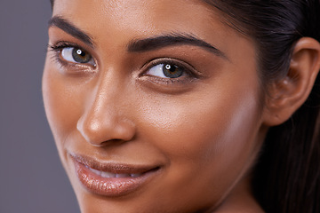 Image showing Portrait, skincare and beauty of happy woman in makeup, glow or shine isolated on gray studio background. Face, closeup and Indian model in cosmetics in spa facial treatment, dermatology or health