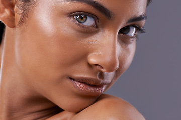 Image showing Portrait, skincare and beauty of woman in makeup, glow or shine isolated on gray studio background. Face, serious and Indian model in cosmetics in spa for facial treatment, dermatology and closeup