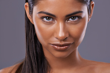 Image showing Portrait, skincare and beauty of woman in makeup, glow or shine isolated on gray studio background. Face, cosmetics and young Indian model in spa for facial treatment, dermatology and skin health