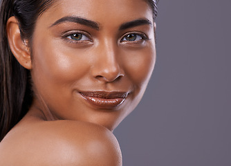 Image showing Portrait, shine and woman with makeup, cosmetics and dermatology on grey studio background. Face, person and model with healthy skin and routine with skincare and grooming with glow and mockup space