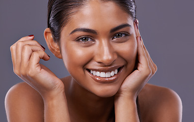 Image showing Portrait, beauty and woman with skincare, glow and grooming routine on a grey studio background. Face, person and model with dermatology and healthy skin with makeup and shine with smile and wellness