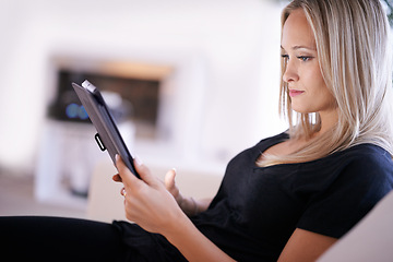 Image showing Tablet, search and woman on sofa with internet, scroll or social media, ebook or streaming at home. Digital, app or female person in a living room online with google it, sign up or netflix and chill