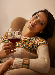Image showing Woman, thinking and relax in home with red wine for daydreaming, wellness and weekend break with smile. Person, face and thoughtful in living room with alcohol for antioxidant or celebration in house