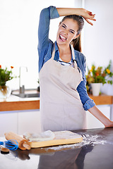 Image showing Portrait, baking and funny face with woman in kitchen of home for carefree or crazy fun with ingredients. Peace, recipe and stove with happy young baker person preparing pastry food in apartment