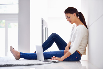 Image showing Laptop, floor and woman in home for remote work, social media or reading email on internet. Computer, freelancer and person on carpet with technology for network, streaming or relax with online blog