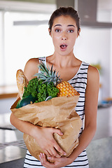 Image showing Home, surprise or portrait of woman with groceries on promotion, sale or discounts deal on nutrition. Wow, news offer or shocked person buying healthy food for cooking organic fruits or diet choice