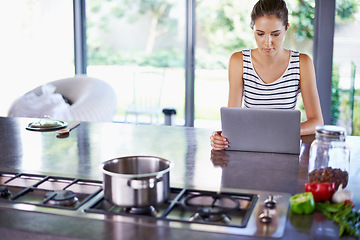 Image showing Woman, kitchen and laptop for food idea, female person and home on internet. Google it, browsing cooking recipes and social media, online search with technology or thinking of healthy meal to prepare