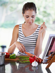 Image showing Cooking, vegetables and woman in kitchen for lunch, dinner and supper for healthy eating. Nutrition, recipe and person with food, ingredients and cutting board for wellness, diet and meal in home