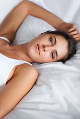 Image showing Morning, wake up and portrait of woman in bed with wellness, confidence and happy in apartment. Face, home and girl in bedroom with peace, calm and relax for healthy sleep, comfort and natural rest.