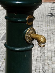 Image showing Historic green water-pump