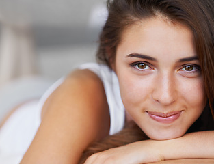 Image showing Portrait, face and woman with smile in bedroom, wellness and wake up from healthy sleep on bed. Morning, girl and female person with happiness to relax with peace, lazy and rest in apartment