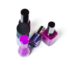 Image showing Purple nail polish, salon and bottle on a white background for beauty, cosmetics and painting nails. Cosmetology, luxury spa and isolated colors for manicure, pedicure and pamper products in studio